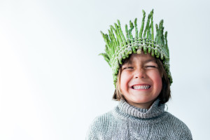 Kid with asparagus crown